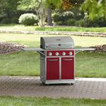 Kenmore Red 4 Burner Gas Grill With Folding Side Shelves and lit knobs